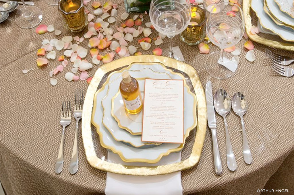 For a ballroom-inspired event, try rich fabric for table linens and napkins