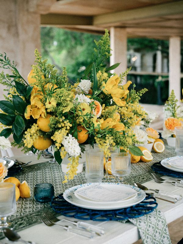 Italian-inspired table linen with thyme green pattern and ornate edges