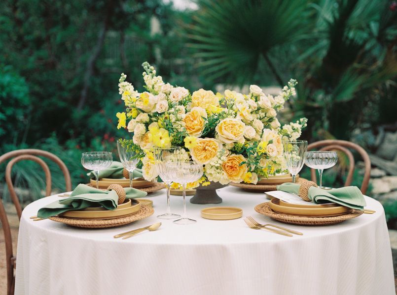 Ticking Lemon tablecloth from Sorrento Sunkiss collection styled for sophisticated dining with effortless Mediterranean elegance