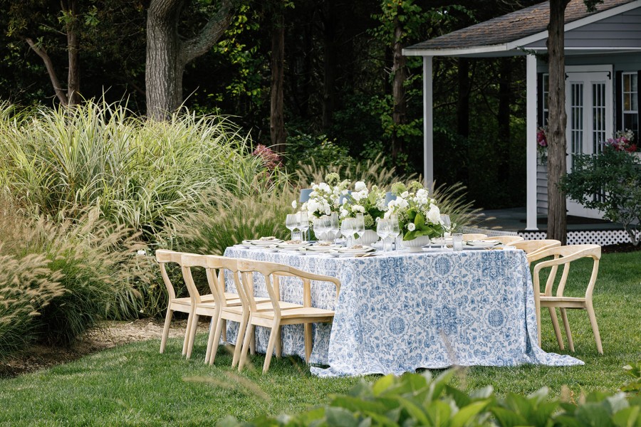 Coastal modern dinner setup with blue linen