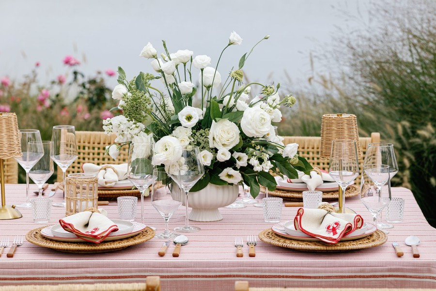 Elegant seaside setting with pink fabric