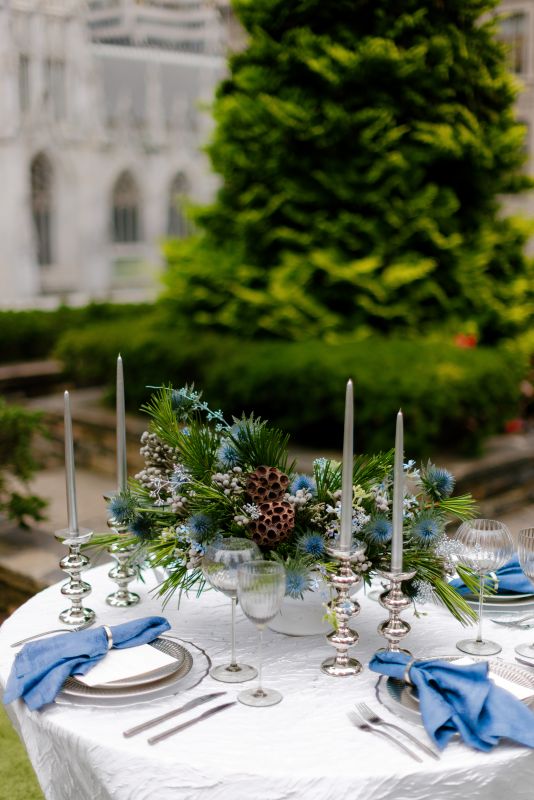 Pale metallic linen with modern glass tableware