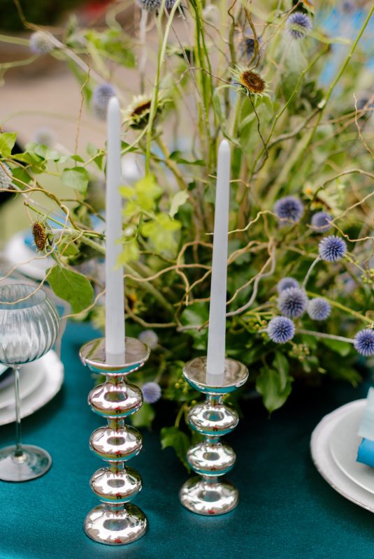 Rich evergreen tablecloth with gemstone-inspired glow