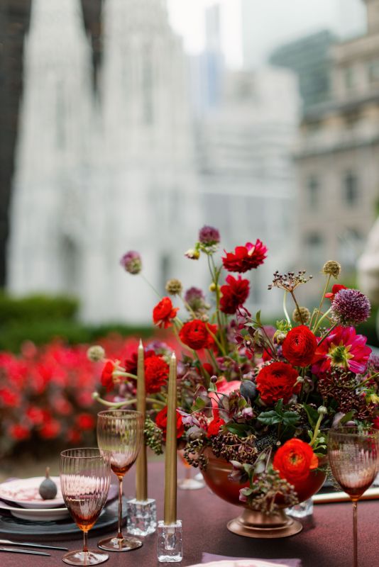Burgundy event table featuring Orly Garnet table linen